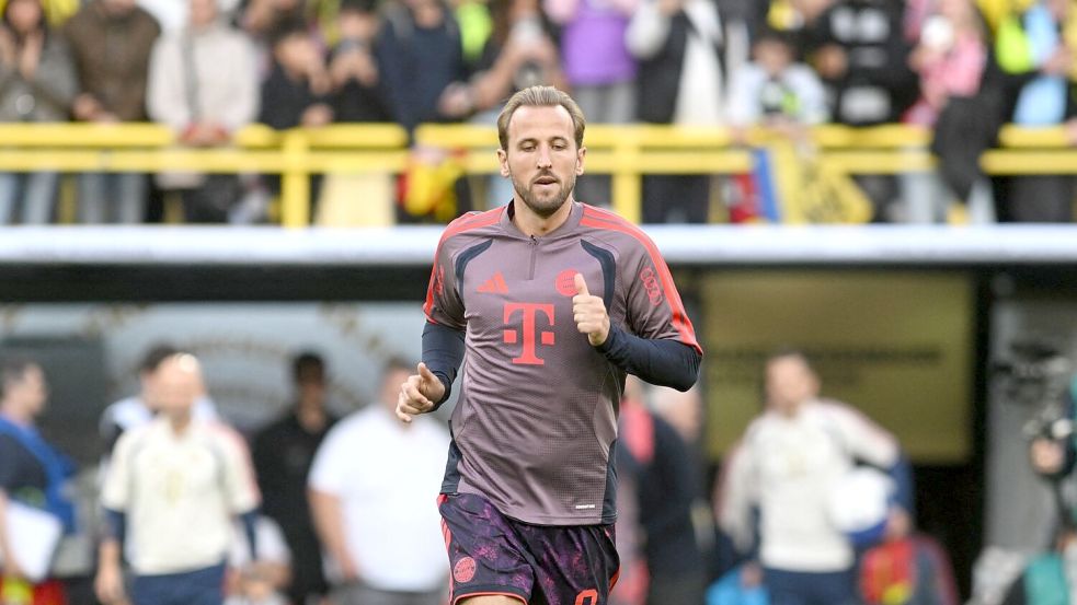 Harry Kane beim Aufwärmen in Dortmund. Foto: Bernd Thissen/dpa