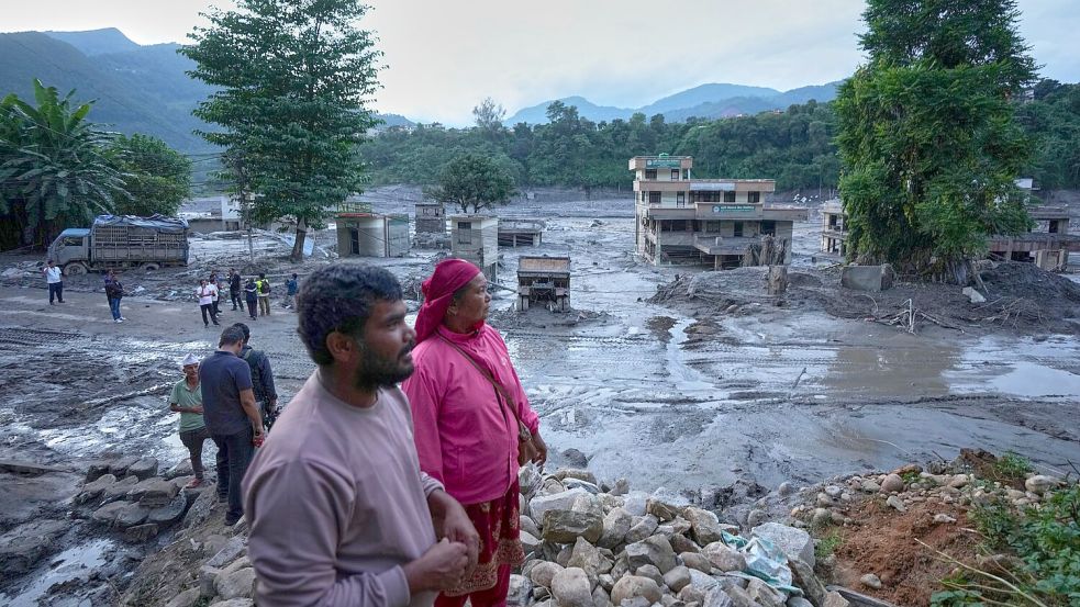 Die Sturzflut hat entlang eines Flusslaufs schwere Schäden angerichtet. Foto: Rajesh Kumar Singh