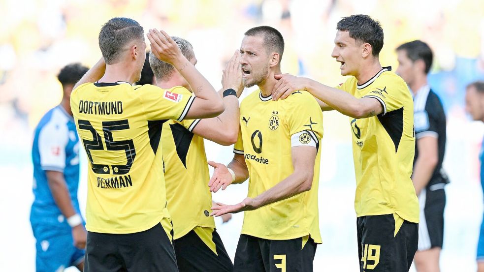 Dortmund feiert eine furiose Aufholjagd. Foto: Uwe Anspach