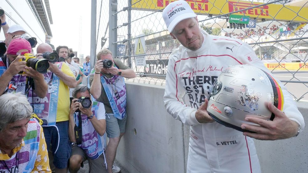 Sebastian Vettel erinnerte an sein Kindheitsidol Michael Schumacher. Foto: Antonio Calanni
