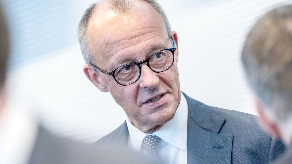 Merz weist die SPD-Vorwürfe erneut zurück. Foto: Michael Kappeler/dpa