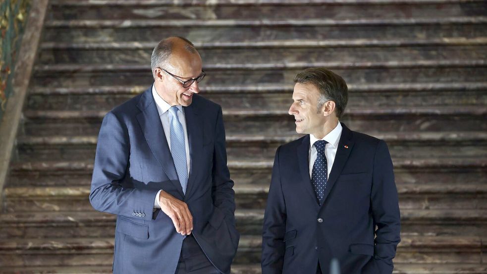 Haben eine deutsch-französische Einigung gefunden: Merz (l) und Macron. (Archivbild) Foto: Oliver Berg/dpa
