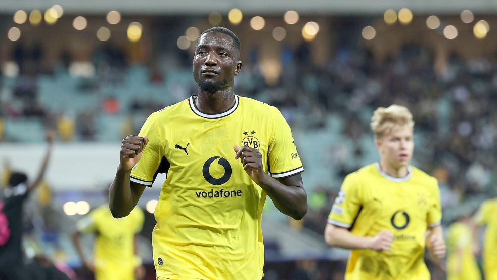 Serhou Guirassy bejubelt das frühe Führungstor des BVB. Foto: Uncredited/AP/dpa