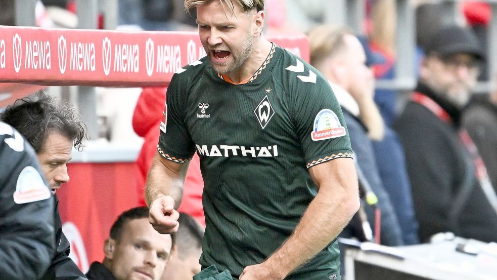 Niclas Füllkrug sieht die Debatte um ein mögliches DFB-Comeback locker. Foto: Florian Wiegand/dpa